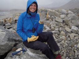 Melissa Reusche on top of a foggy mountain