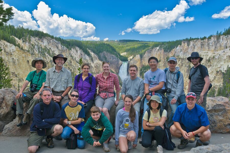 A Geosciences group poses in front of a Yellowstone Grand Canyon.